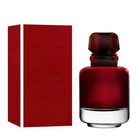 Empty decorative red glass bottle with cap, no liquid, for home decor