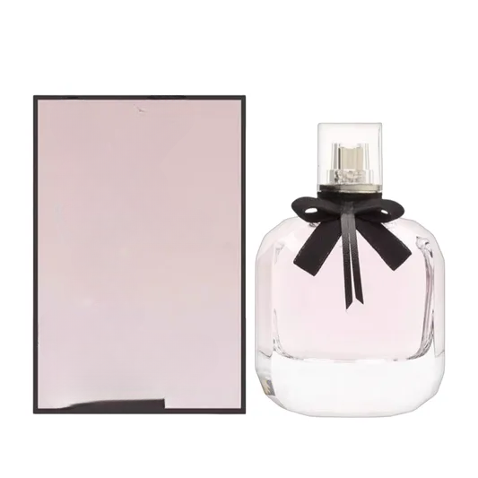 Empty decorative glass bottle with black bow, ideal for home decor, no liquid inside